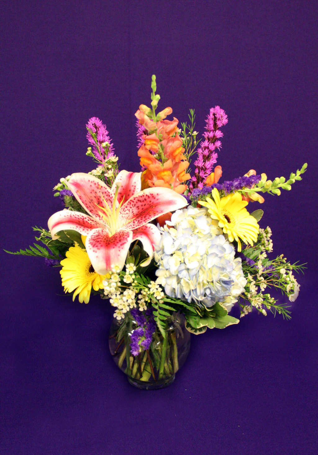 Floral arrangements with lillies, daisies, and delphiniums from Mon General Hospital Gift Shop